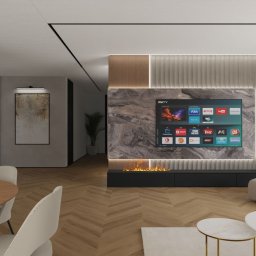 Lofera - Nowoczesny salon z parkietem w jodełkę, ścianą z marmuru za telewizorem i biokominkiem. Minimalistyczne meble i oświetlenie tworzą elegancką przestrzeń.
