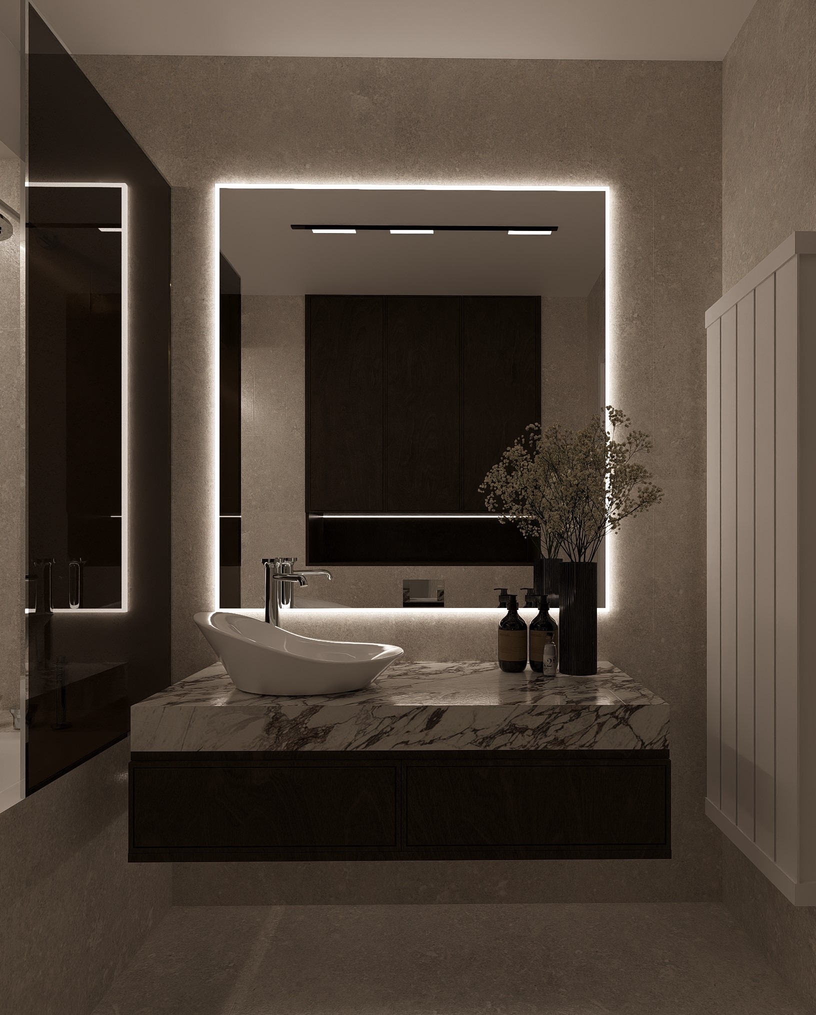 Nowoczesna łazienka z podświetlanym lustrem, marmurowym blatem i owalną umywalką. Minimalistyczny design z akcentami w postaci czarnych wazonów i dozowników.