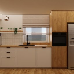 Flow Studio Projektowe Ewa Zarazińska - Nowoczesna kuchnia z drewnianymi i białymi szafkami, srebrną lodówką Bosch i drewnianą podłogą. Nad blatem półka z roślinami i ekspres do kawy.