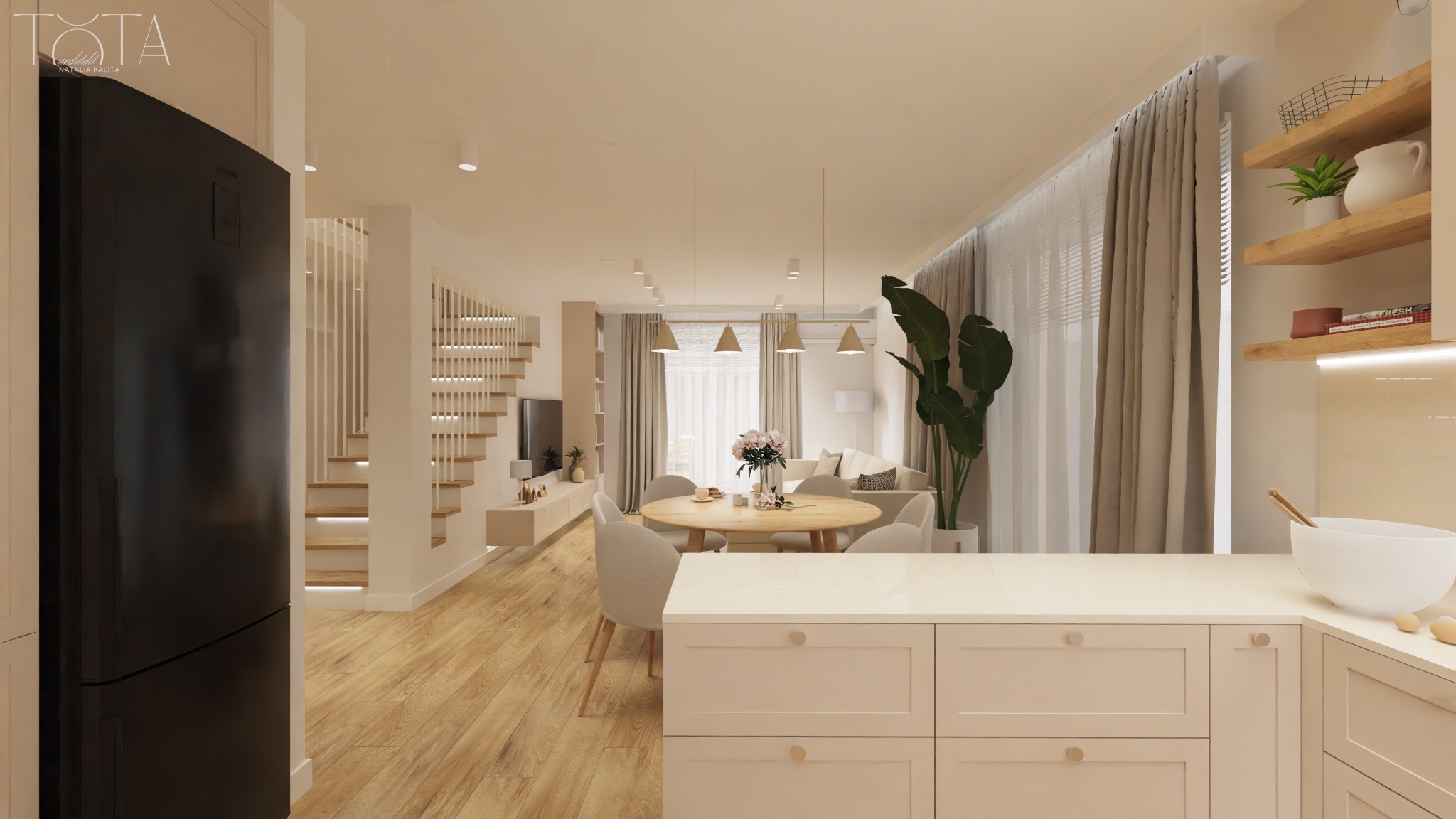 Przytulne wnętrze, którego serce stanowi okrągły, rozkładany stół.