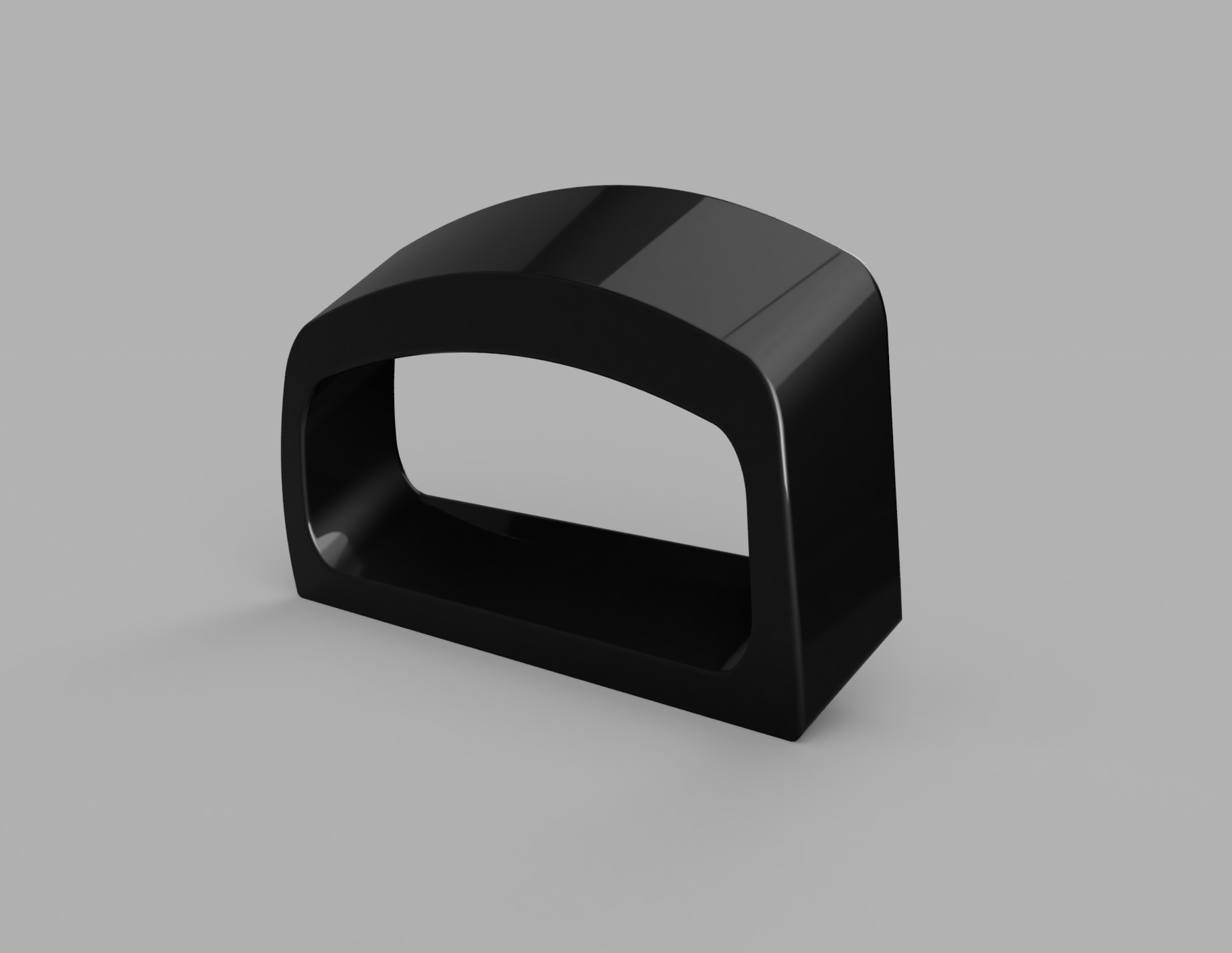 Czarny, błyszczący model 3D o zaokrąglonym kształcie, przypominający ramkę lub uchwyt, na jednolitym szarym tle. Widoczny cień podkreśla trójwymiarowość obiektu.