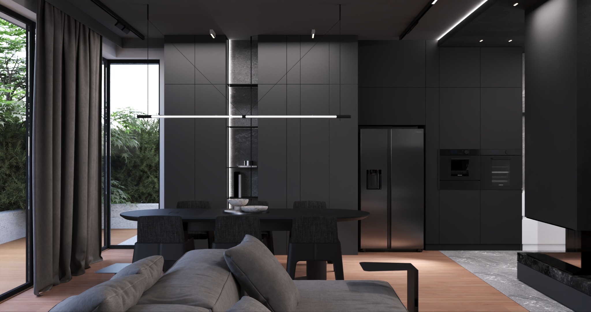 Nowoczesna, czarna kuchnia z jadalnią. Minimalistyczny design, oświetlenie LED, zabudowa meblowa pod sufit. Widok z salonu na stół i krzesła. Duże okno z widokiem na zieleń.