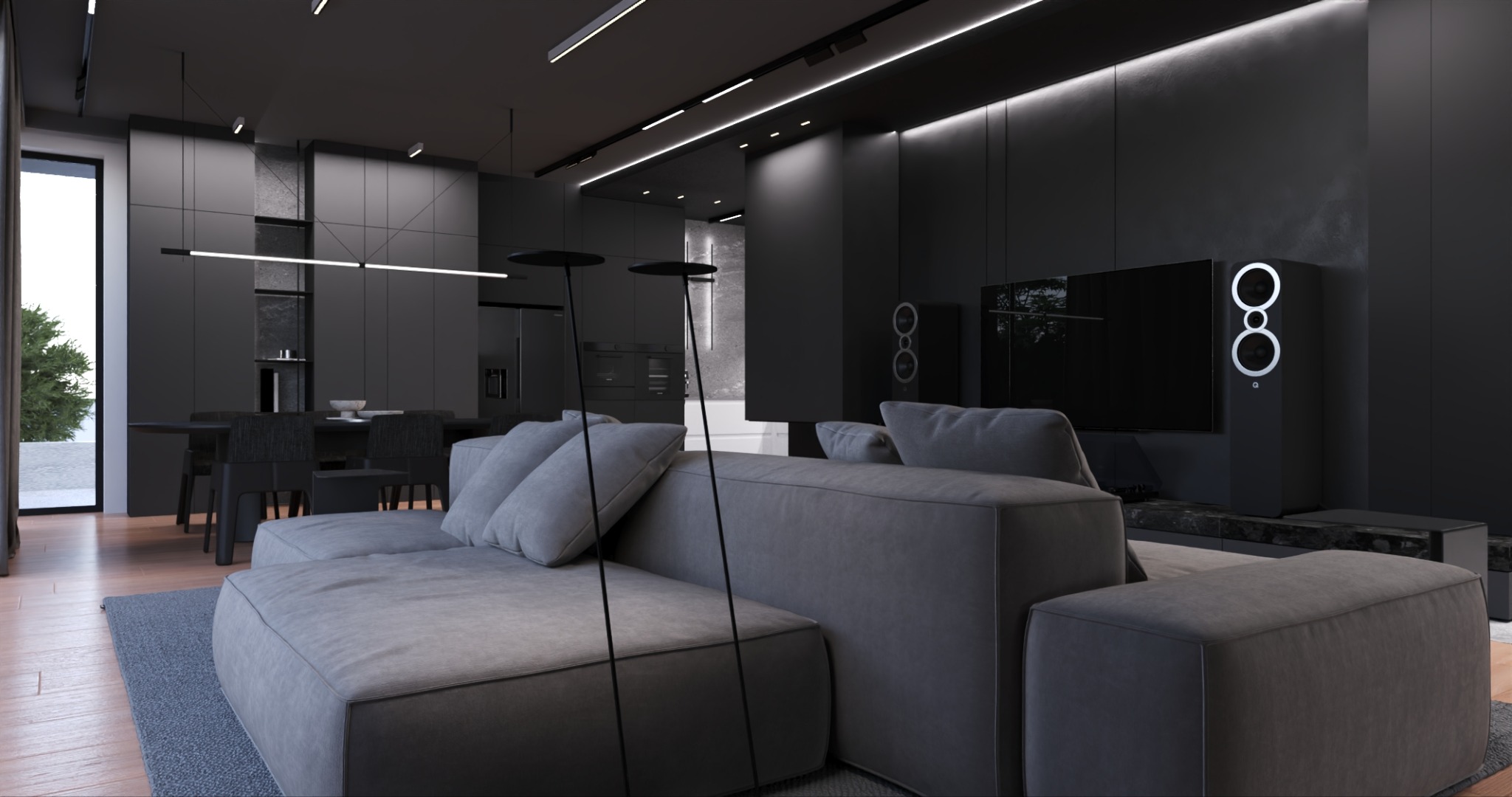 Nowoczesny salon w odcieniach szarości i czerni. Minimalistyczny design z sofą modułową, oświetleniem LED i elementami dekoracyjnymi. Widok na jadalnię i kuchnię.