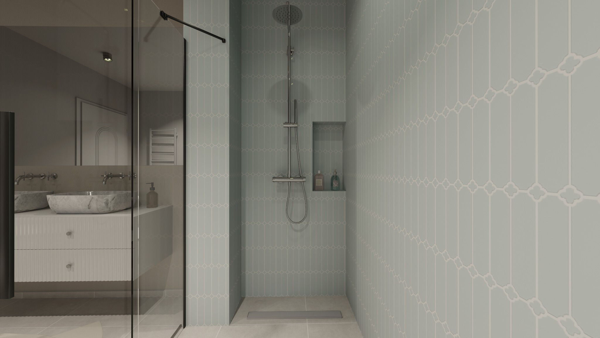 Nowoczesna łazienka z kabiną prysznicową typu walk-in, wykończona w pastelowych odcieniach. Uwagę przykuwają płytki o unikalnym wzorze i marmurowa umywalka.