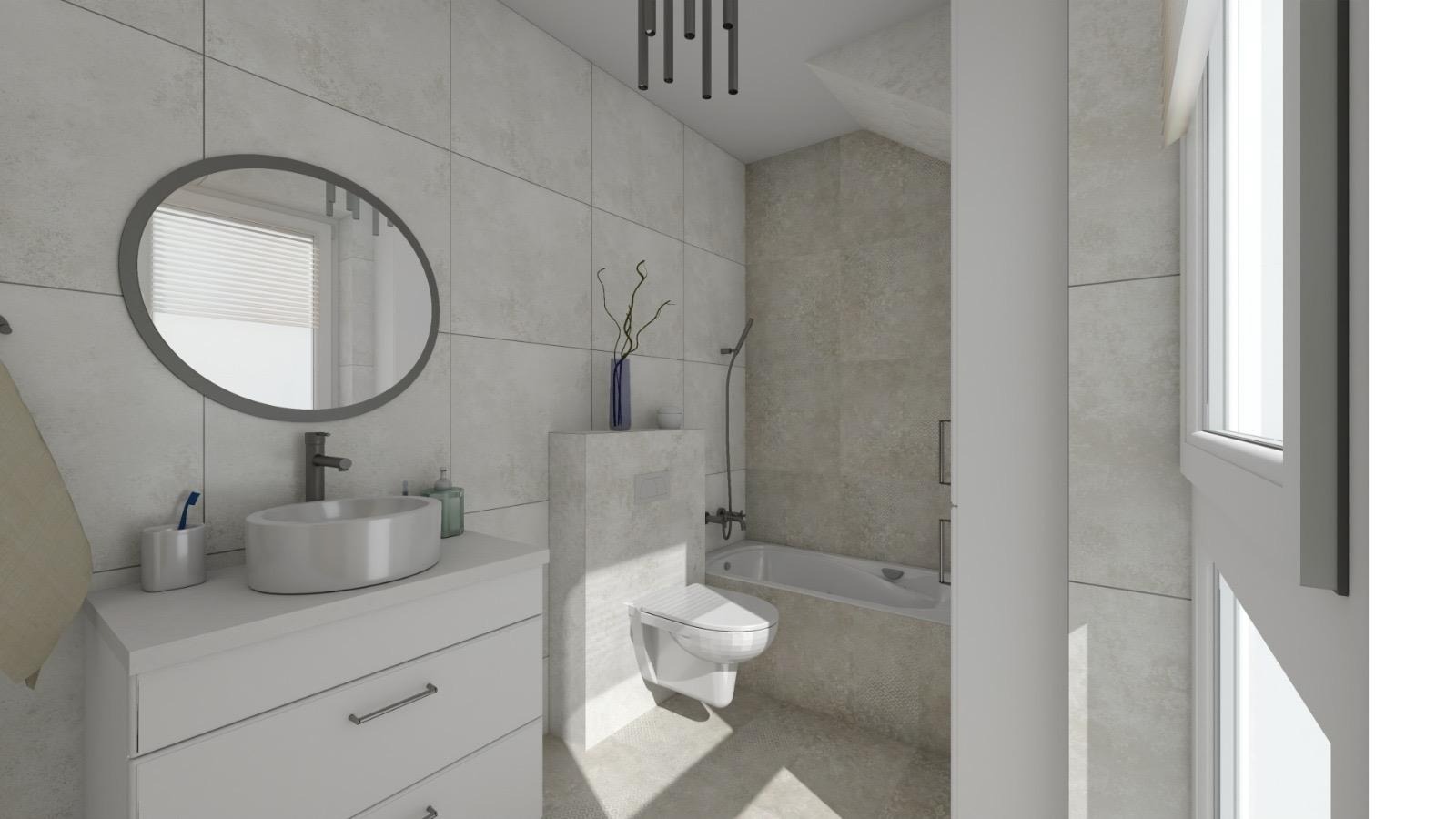Nowoczesna łazienka z owalnym lustrem, białą umywalką na szafce, podwieszaną toaletą i wanną. Szare płytki na ścianach i podłodze. Minimalistyczne oświetlenie sufitowe.