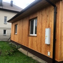 FHU Tom Drew Bud - Elewacja drewnianego domu deska elewacyjna z modrzewia