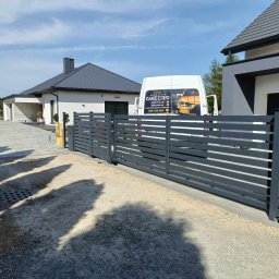 Krzysztof Wyciślik - Montaż Ogrodzenia z Siatki Chorz&oacute;w