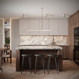 Alicja Kobiałka Interiors - Nowoczesna kuchnia z wyspą i marmurowym blatem. Drewniane szafki, minimalistyczne oświetlenie i parkiet w jodełkę tworzą elegancką przestrzeń.