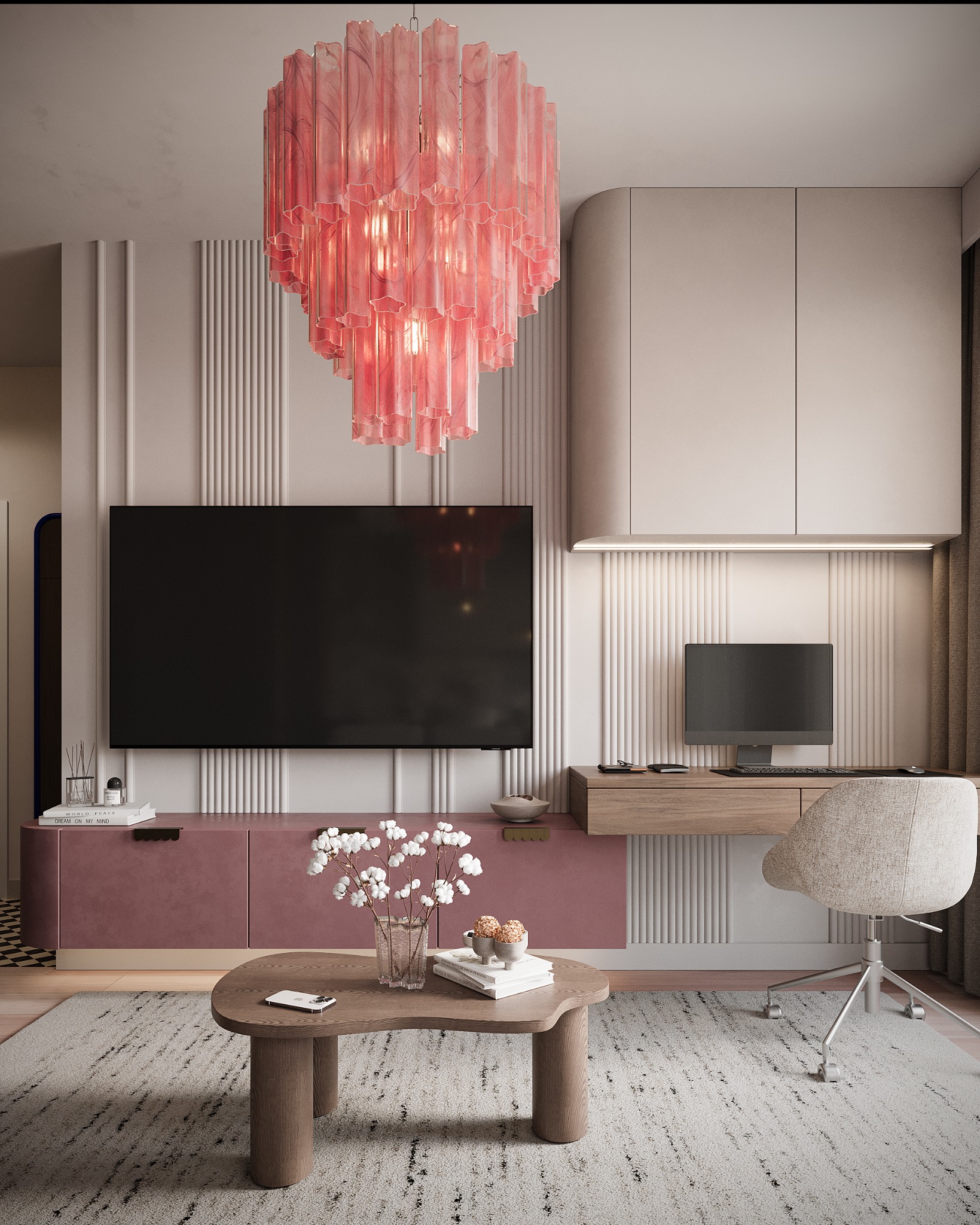Nowoczesny salon z różowym akcentem: designerski żyrandol, telewizor na tle dekoracyjnej ściany, biurko z komputerem i dywan w geometryczny wzór. Stonowana kolorystyka.