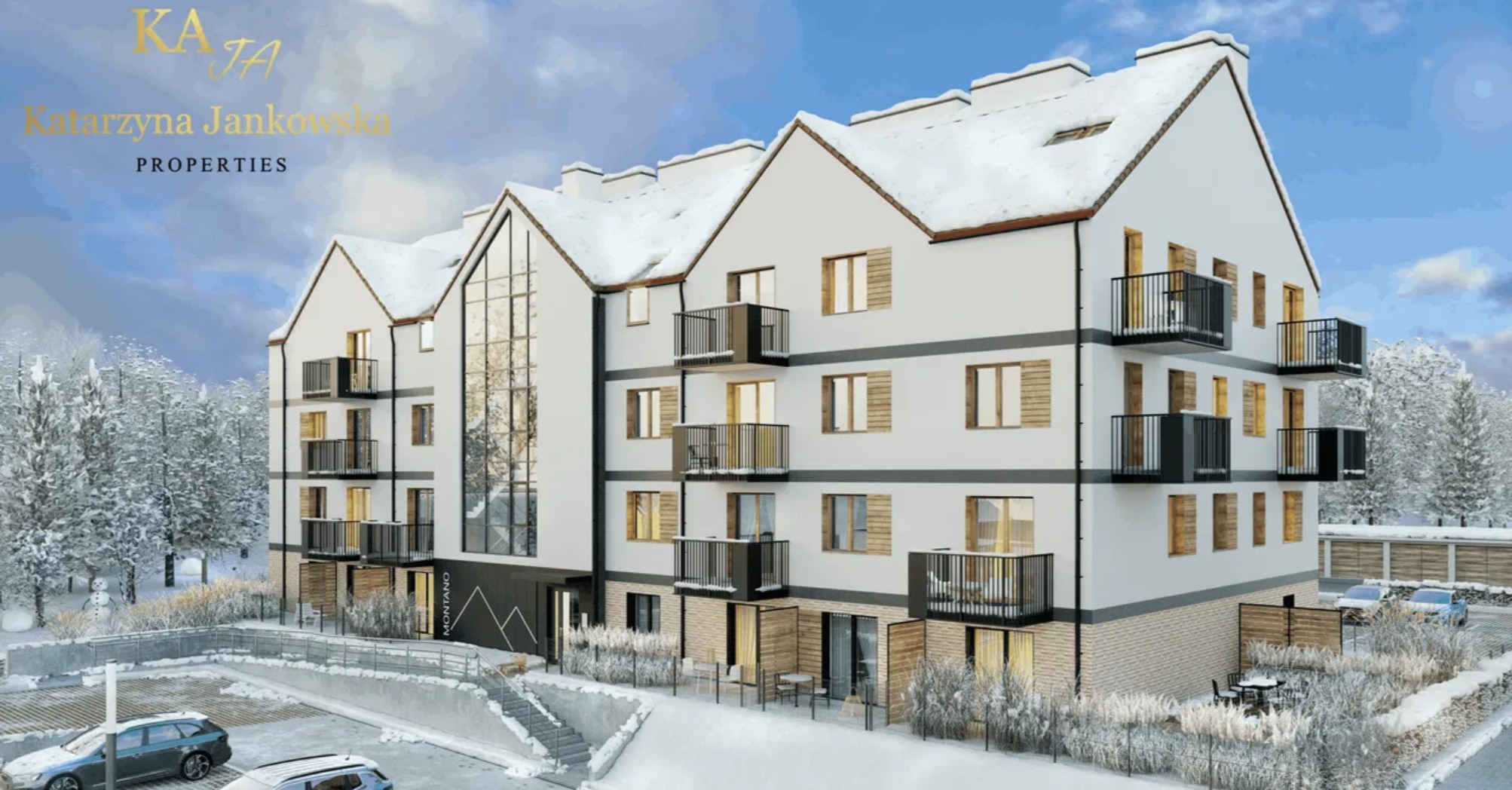 Zimowy widok apartamentowca z balkonami i parkingiem, pokrytego śniegiem, z logo 'Katarzyna Jankowska PROPERTIES' w górnym rogu. Architektura w stylu nowoczesnej kamienicy.