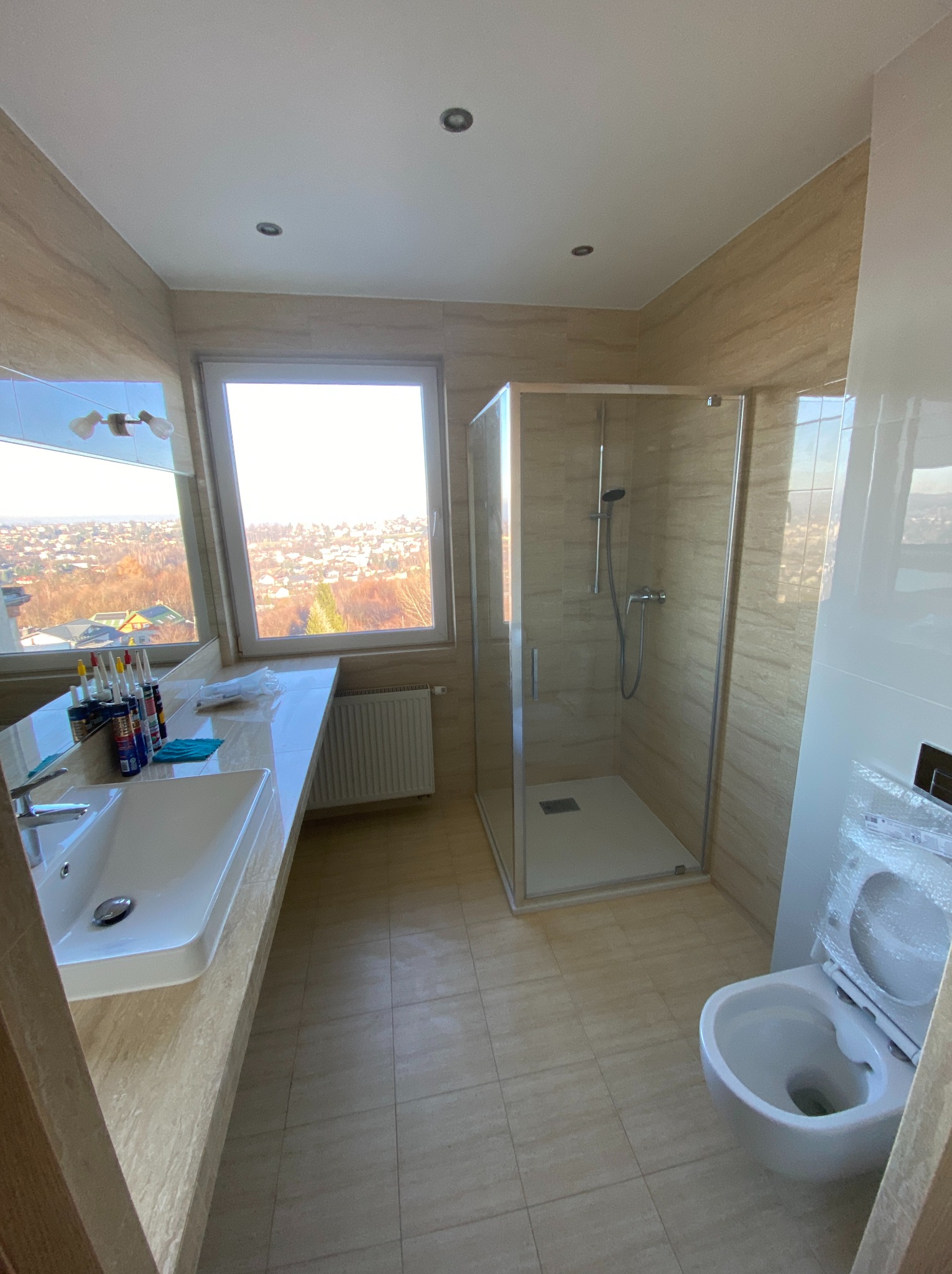 Montaż prysznica, montaż geberitu z zabudową +prace glazurnicze oraz montaż umywalki wraz z baterią.