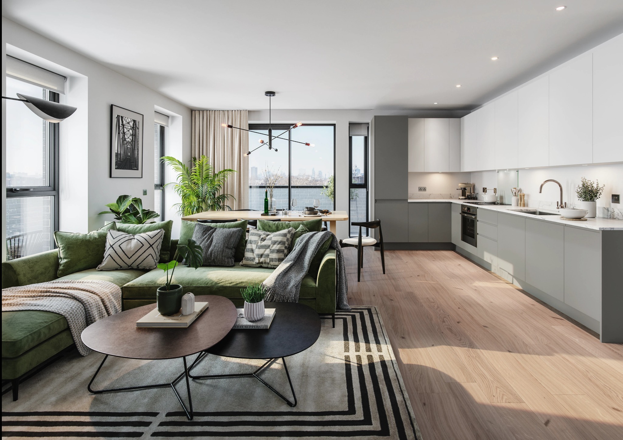 Nowoczesne wnętrze: zielona sofa narożna z poduszkami, stoliki kawowe, dywan w pasy, stół z krzesłami i kuchnia w odcieniach szarości. Duże okna z widokiem na miasto.