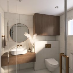 Zinna Interiors - Nowoczesna łazienka z drewnianą szafką pod umywalką, okrągłym lustrem i białymi płytkami. Minimalistyczny design z akcentami w kolorze drewna i złotymi detalami.
