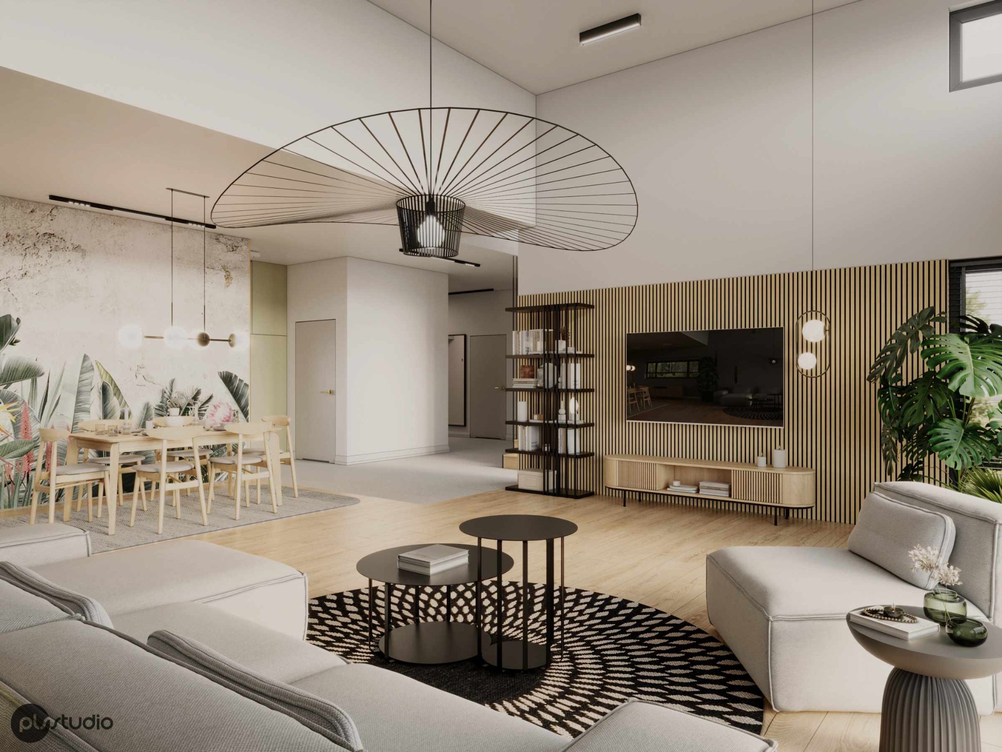 Jasne wnętrze salonu z jadalnią: sofa, stoliki kawowe na wzorzystym dywanie, drewniana ściana TV, regał i stół z krzesłami przy ścianie z motywem roślinnym.