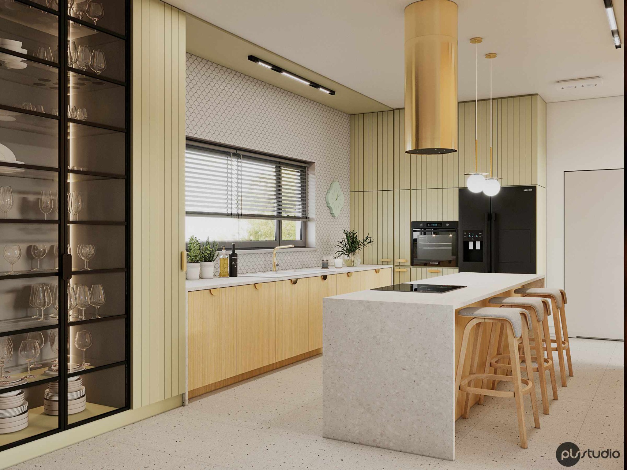Jasna kuchnia z drewnianymi szafkami, wyspą z blatem w terrazzo i złotym okapem. Widoczna przeszklona witryna z zastawą i krzesła barowe.