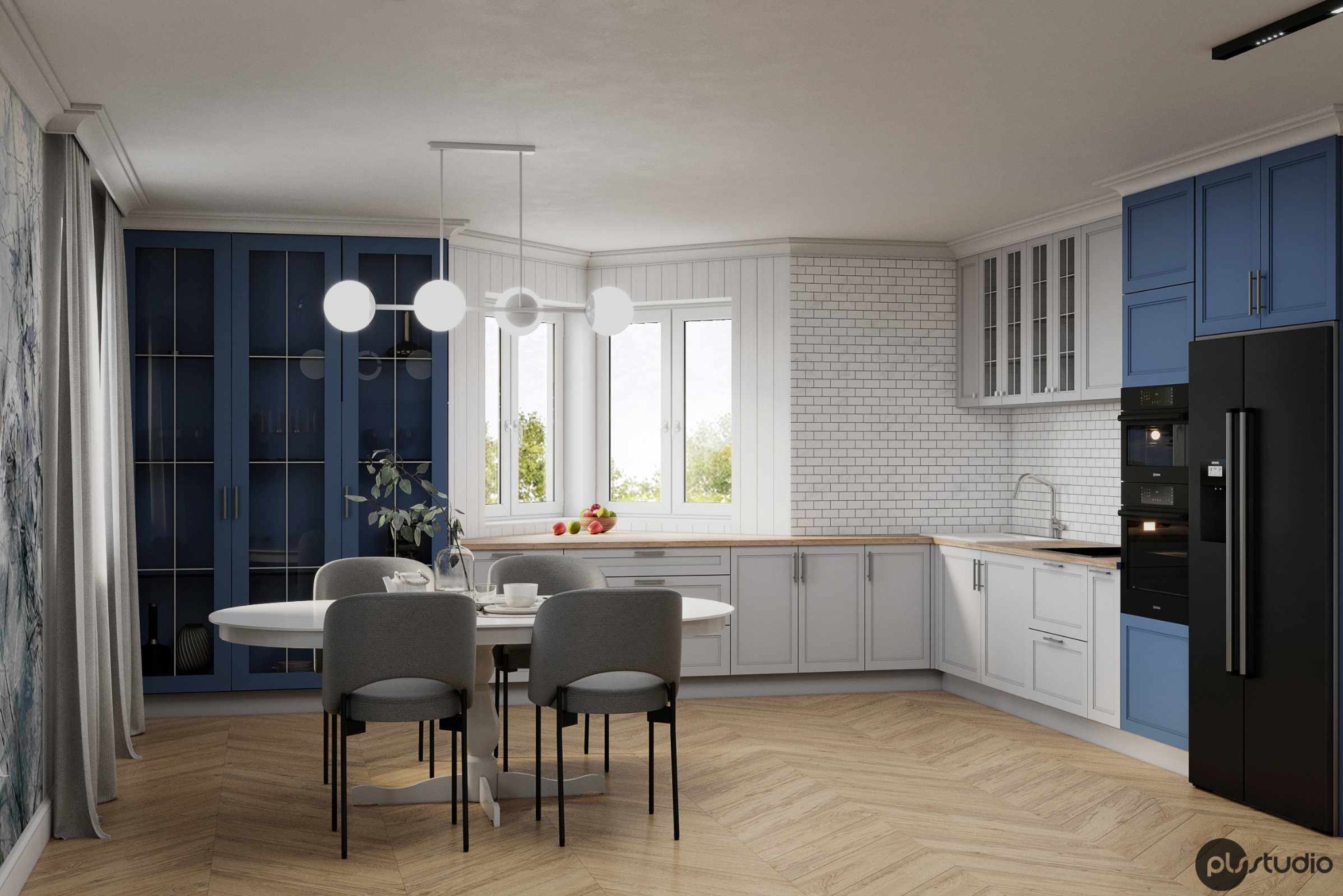Nowoczesna kuchnia z białymi i niebieskimi szafkami, drewnianym blatem, białymi płytkami na ścianie i parkietem w jodełkę. Okrągły stół z szarymi krzesłami.