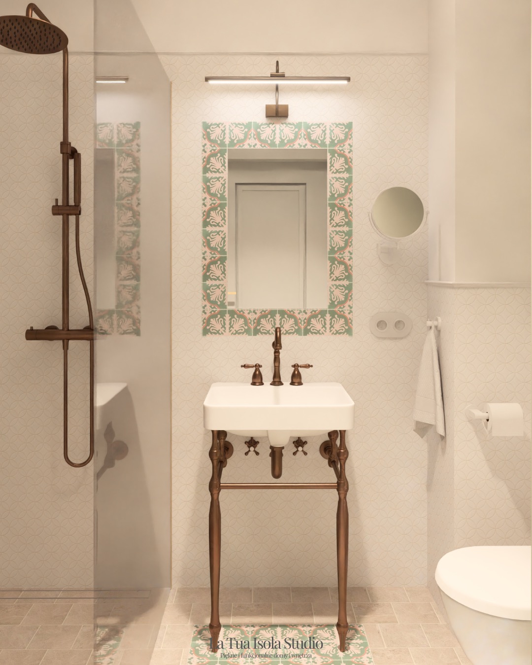 Biała umywalka na metalowym stelażu w łazience z kabiną prysznicową i lustrem w ozdobnej ramie z płytek. Styl retro, ciepłe oświetlenie.