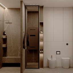 PRACOWNIA PROJEKTOWA WERONIKA STEFFEN-LOTARSKA - Nowoczesna łazienka z kabiną prysznicową typu walk-in, zabudową meblową w odcieniach beżu i szarości oraz elementami dekoracyjnymi. Minimalistyczny design, subtelne oświetlenie.
