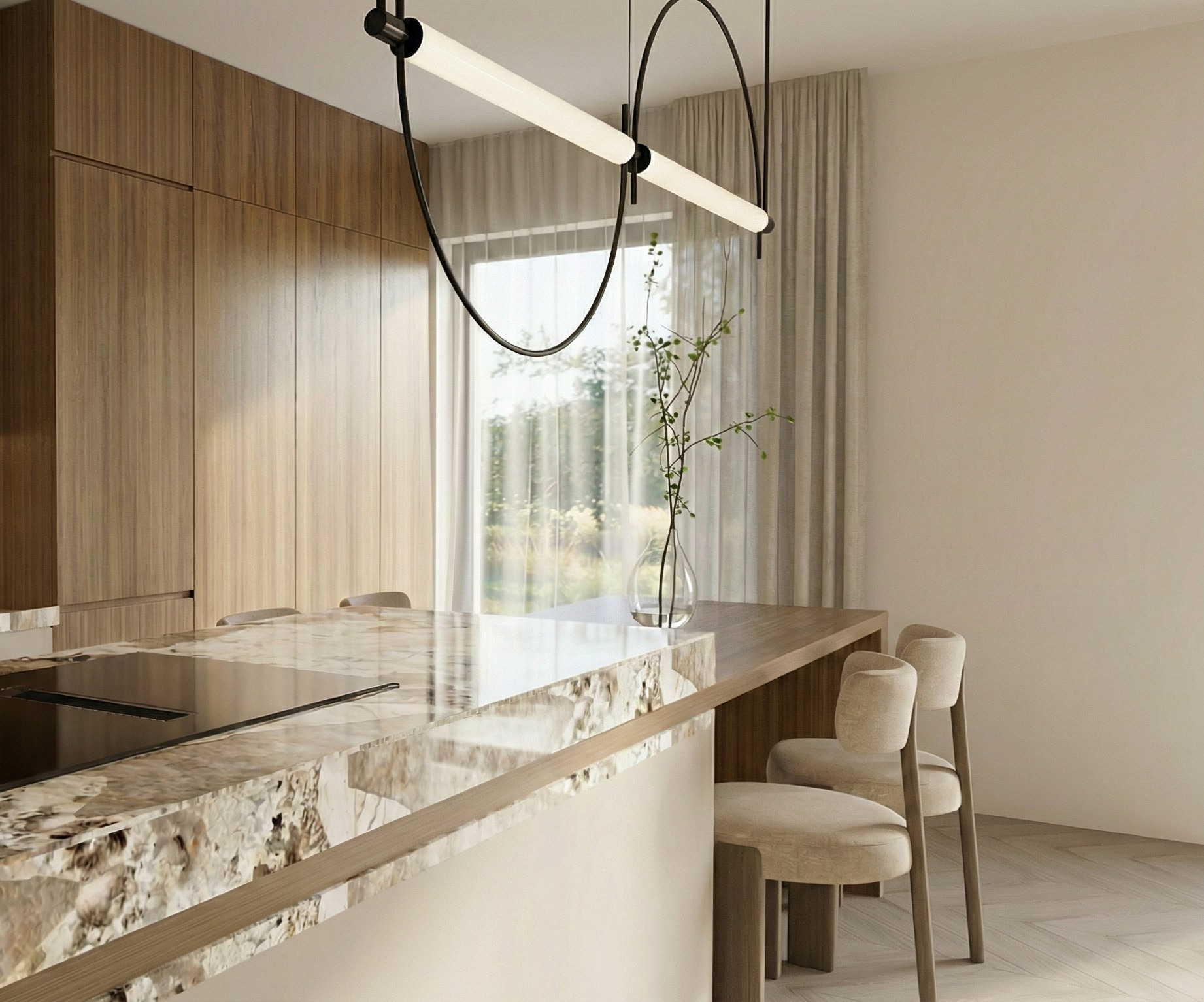 Nowoczesna kuchnia z wyspą o marmurowym blacie, minimalistycznym oświetleniem i drewnianymi szafkami w tle. Jasne, naturalne światło podkreśla elegancję wnętrza.