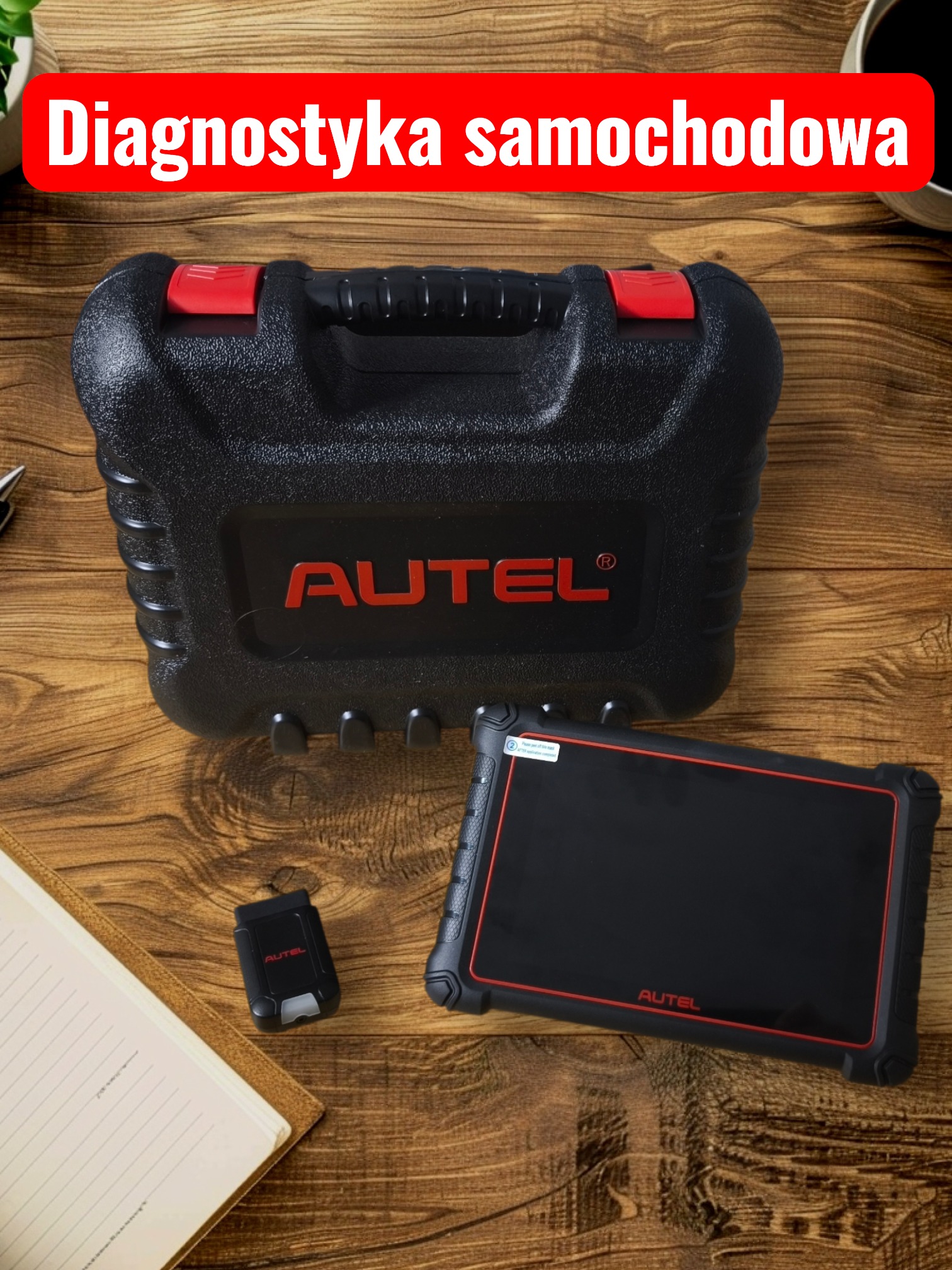 Zestaw diagnostyczny Autel: czarna walizka, tablet z odklejoną folią ochronną i adapter na drewnianym biurku z notatnikiem. Narzędzia do diagnostyki samochodowej.