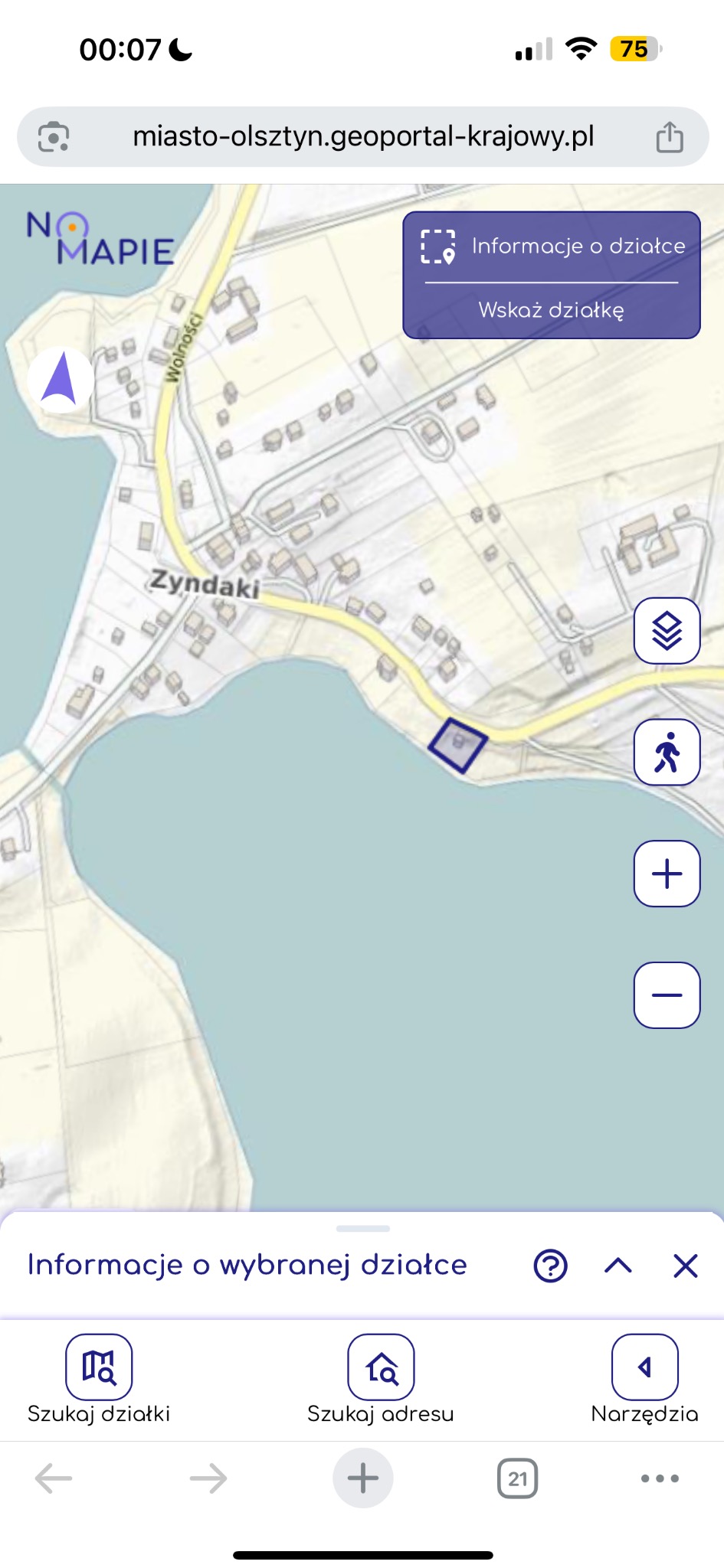 Mapa geodezyjna z zaznaczoną działką w Zyndakach, wyświetlona na ekranie smartfona. Widoczne narzędzia geoportalu i opcje wyszukiwania działek.
