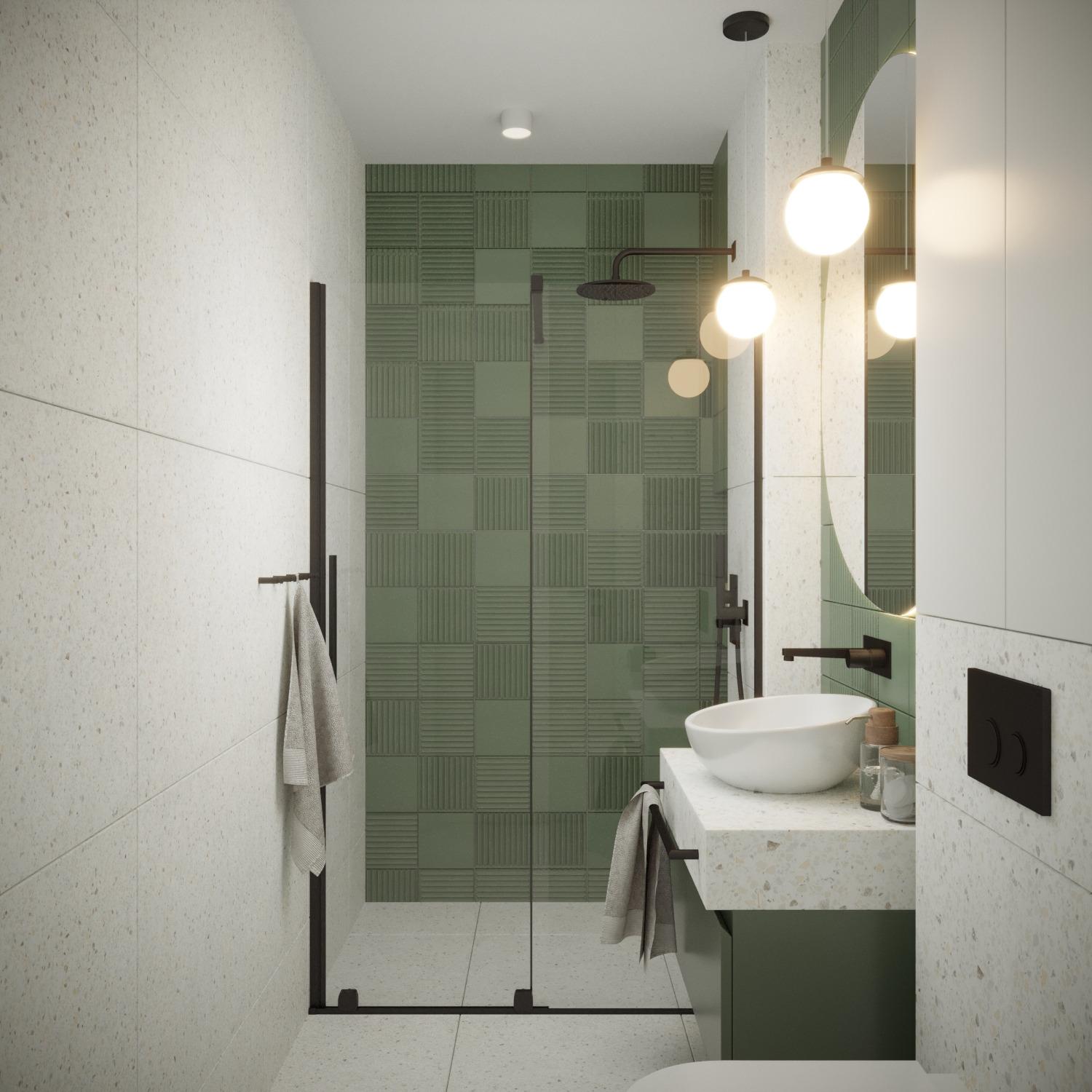 Nowoczesna łazienka z zielonymi płytkami w kabinie prysznicowej, okrągłym lustrem z podświetleniem i blatem z umywalką nablatową. Minimalistyczny design.