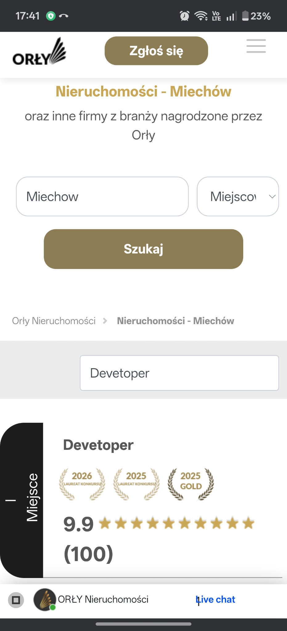 Ekran smartfona z widokiem strony agencji nieruchomości Orły Nieruchomości, z oceną 9.9 i nagrodami za lata 2025-2026, w kontekście Miechowa.