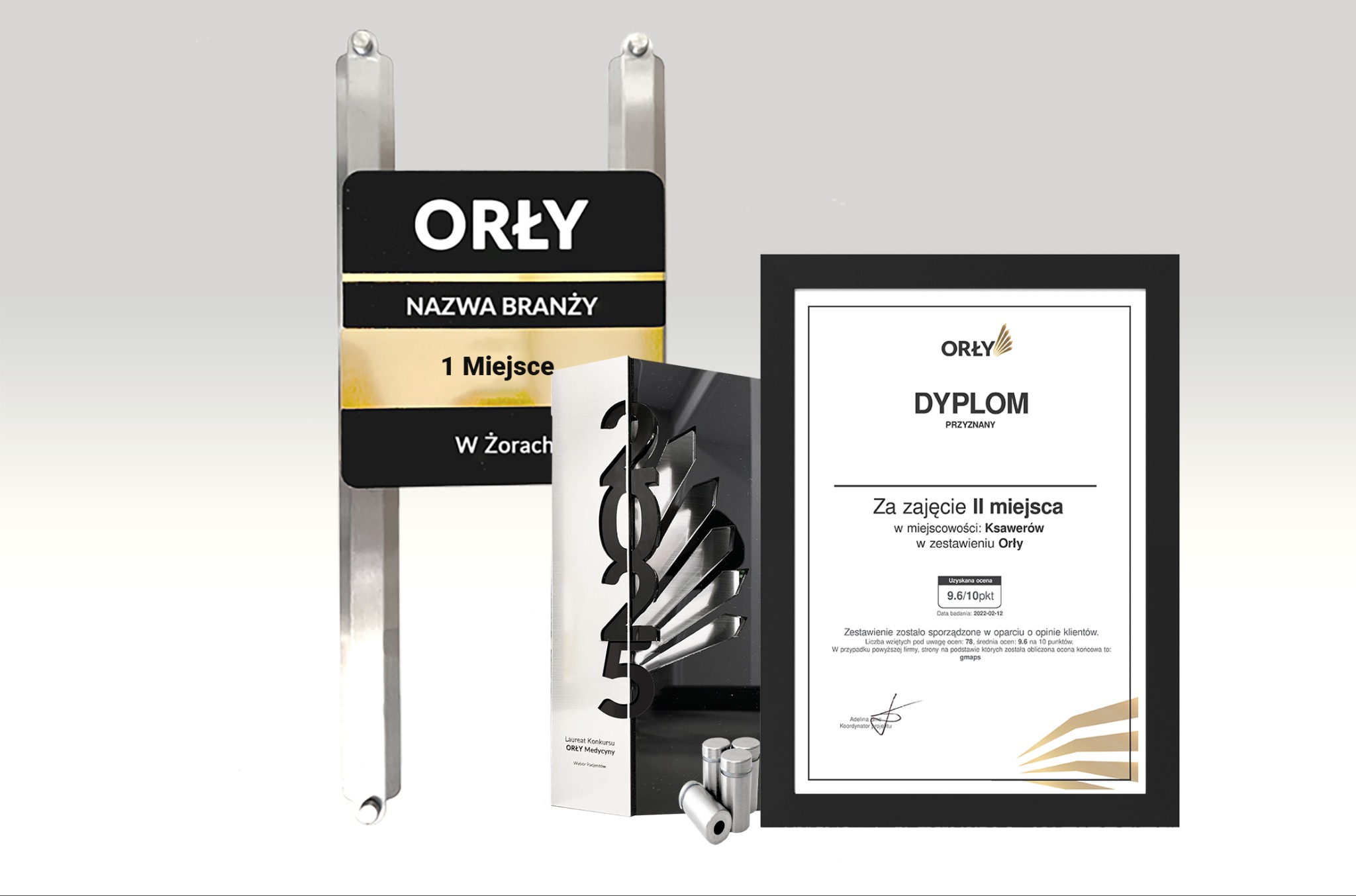 Nagrody i dyplom 'Orły' dla firmy z Ksawerowa, zajęcie II miejsca. Tabliczka z napisem '1 Miejsce' i logo. Prestiżowe wyróżnienie za opinie klientów.
