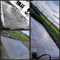 Lewy - Nowa, szara nawierzchnia z kostki brukowej, ułożona na zewnątrz, z widocznym fragmentem budynku i ogrodzeniem w tle. Ujęcie z perspektywy.