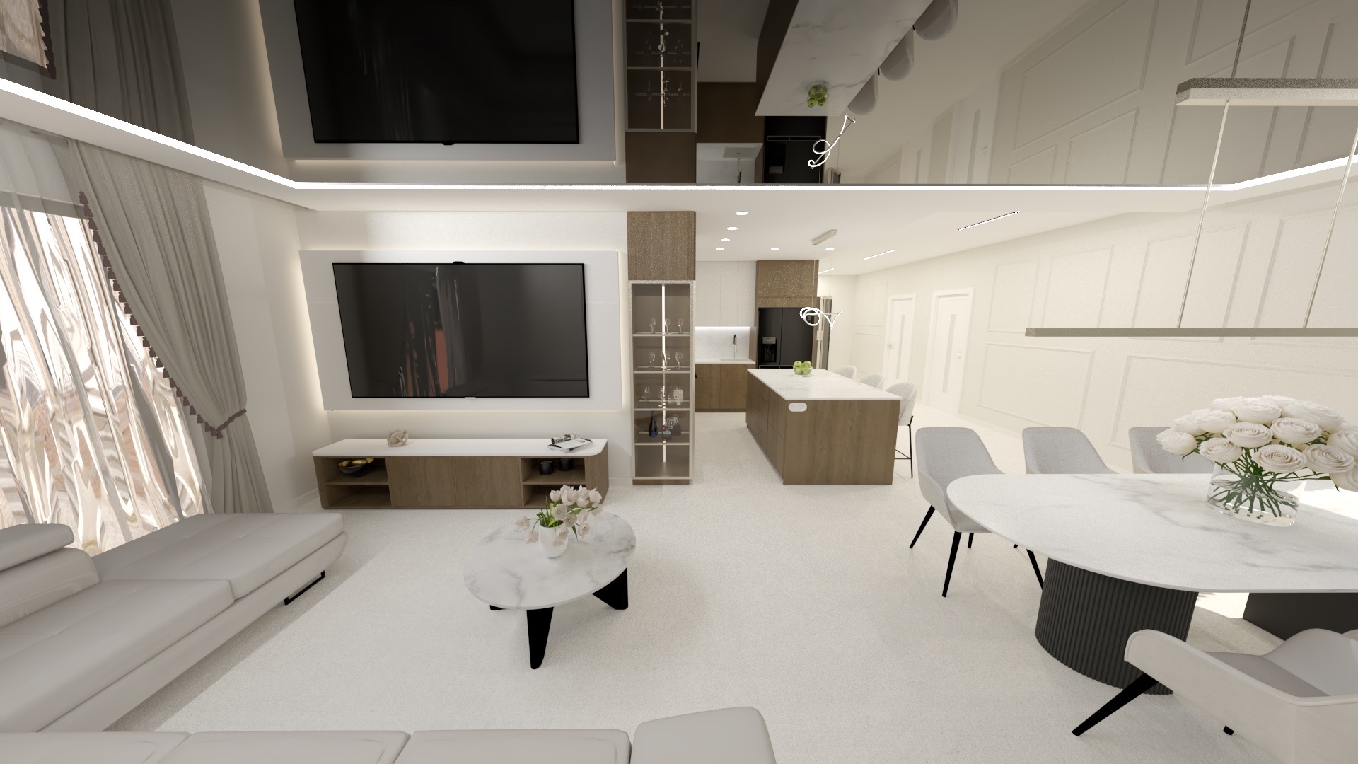 Wnętrze otwartego salonu z kuchnią w jasnej tonacji. Widoczny narożnik, stół z kwiatami, wyspa kuchenna i telewizor. Nowoczesny design z elementami dekoracyjnymi.