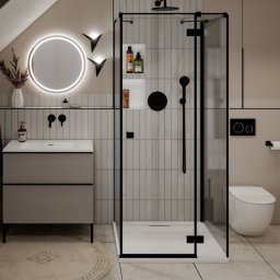 Materna Design - Nowoczesna łazienka na poddaszu z kabiną prysznicową typu walk-in, okrągłym lustrem z podświetleniem LED i beżową szafką pod umywalką. Minimalistyczny design.