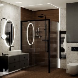 Materna Design - Nowoczesna łazienka z kabiną prysznicową typu walk-in, podświetlanymi lustrami owalnymi i umywalką nablatową na szafce z szufladami w odcieniach szarości i brązu.