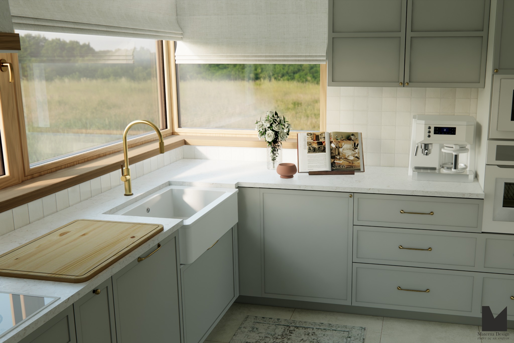 Jasna kuchnia z oknem na zielony krajobraz. Biały zlew farmerski, złota bateria, drewniana deska do krojenia. Stonowana kolorystyka szafek i blatu. Ekspres do kawy.