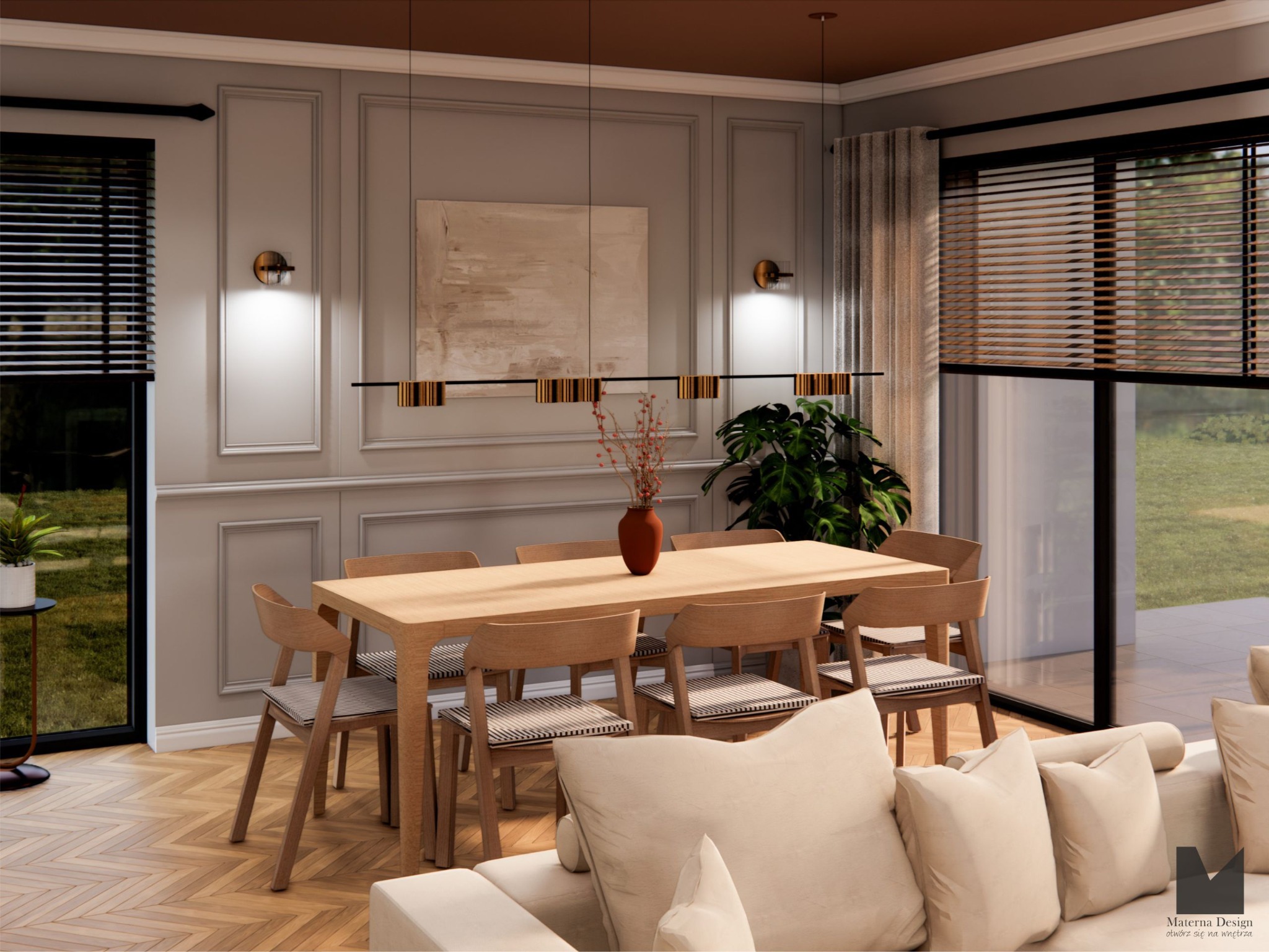 Jasna jadalnia z drewnianym stołem i krzesłami w stylu skandynawskim. Na stole wazon z kwiatami. W tle obraz i roślina doniczkowa. Widok z salonu na jadalnię.