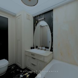 Kristobal Design - Elegancka łazienka z czarno-białymi marmurowymi płytkami, owalnym lustrem i kremowymi meblami. Widoczna toaleta i wanna. Projekt z sygnaturą projektanta.