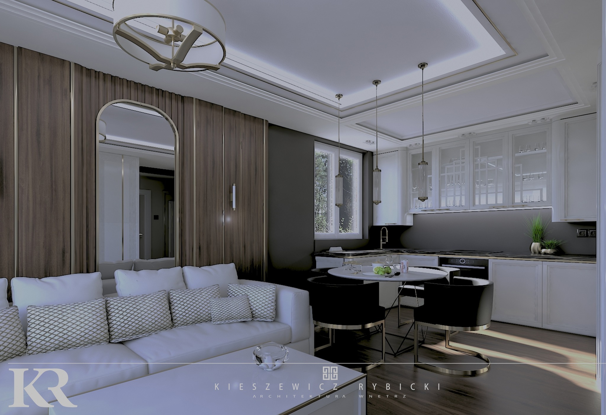 Eleganckie wnętrze: salon z sofą w odcieniach bieli, drewniana ściana z lustrem, okrągły stół z krzesłami i aneks kuchenny w bieli i czerni. Całość doświetlona nowoczesnymi lampami.