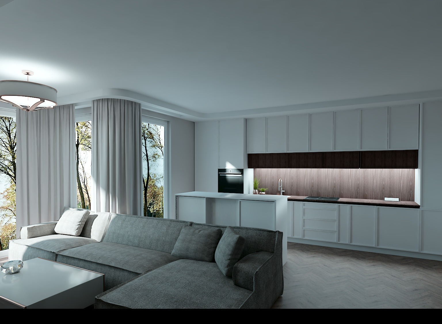 Nowoczesne wnętrze: szara sofa narożna, biała kuchnia z drewnianym akcentem, duże okna z widokiem na drzewa. Minimalistyczny design, jasne kolory, parkiet w jodełkę.