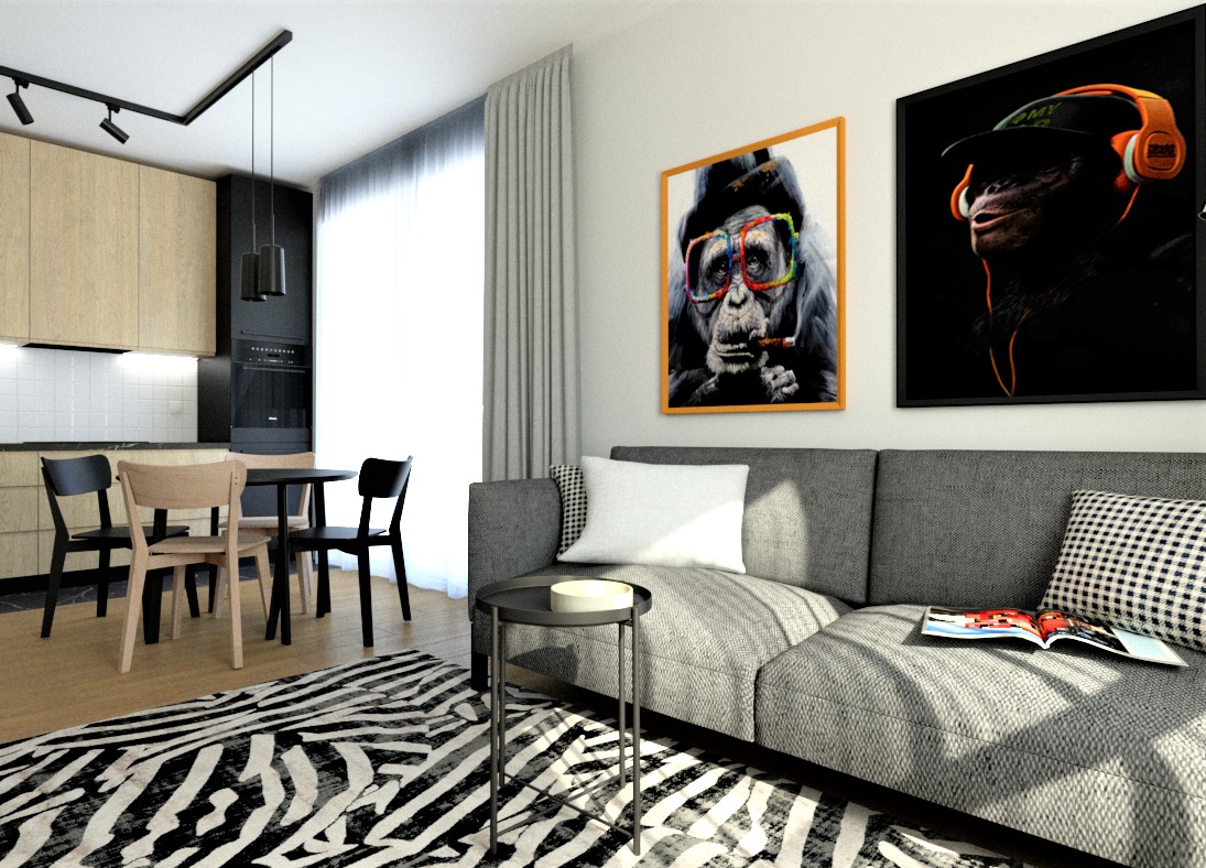 Nowoczesne wnętrze: szara sofa z poduszkami, stolik, dywan w zebrę, stół z krzesłami i obrazy z małpami na ścianie. Jasne, przestronne pomieszczenie.