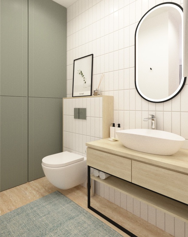Nowoczesna łazienka z owalnym lustrem LED, umywalką nablatową i szafką z drewnianym blatem. Minimalistyczny design, białe płytki i akcenty w kolorze jasnej zieleni.