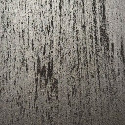 ARTESSA HOME SPÓŁKA Z OGRANICZONĄ ODPOWIEDZIALNOŚCIĄ - Szara ściana z wyraźną fakturą i pionowymi, ciemniejszymi smugami, przypominająca efekt dekoracyjny po malowaniu.