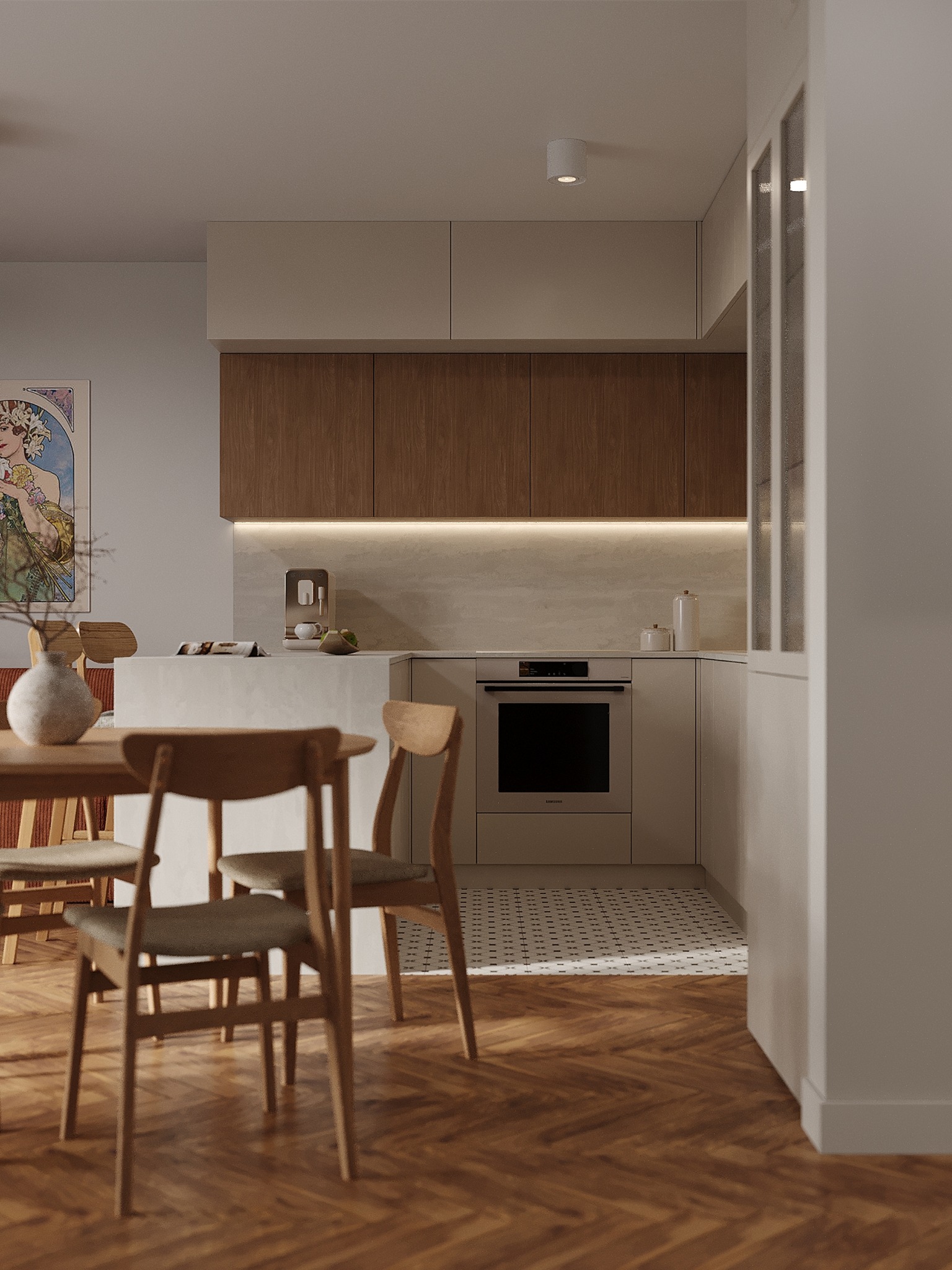 Jasna kuchnia z drewnianymi akcentami: szafki, parkiet w jodełkę, stół z krzesłami. Na blacie ekspres do kawy i dekoracje. W tle plakat w stylu Art Nouveau.