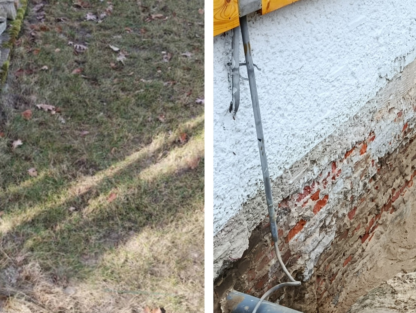 Odkryta ceglana ściana budynku z fragmentami białego tynku i wystającą rurą, widoczna trawa obok. Prace ziemne przy fundamentach.