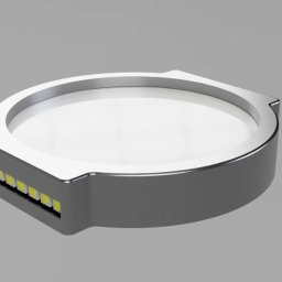 Kamil Czernik - Wizualizacja 3D okrągłego elementu z diodami LED, srebrna obudowa, białe wnętrze, szare tło. Modelowanie z precyzyjnymi detalami.