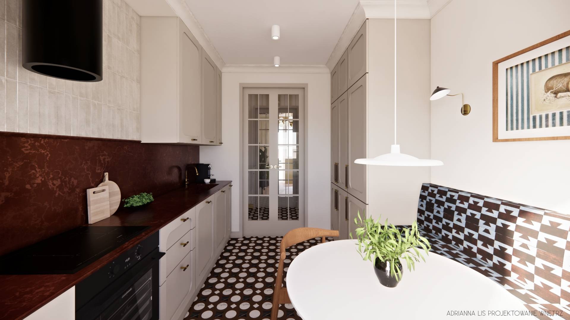 Wnętrze kuchni z jadalnią w stylu eklektycznym: ciemna zabudowa, wzorzysta podłoga, okrągły stół z rośliną i grafika na ścianie. Widok na przeszklone drzwi.