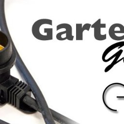 Anna Horwacik - Czarna girlanda ogrodowa z żarówką E27, widoczna z bliska na białym tle. Napis 'Garten Girlande' i logo producenta oświetlenia.