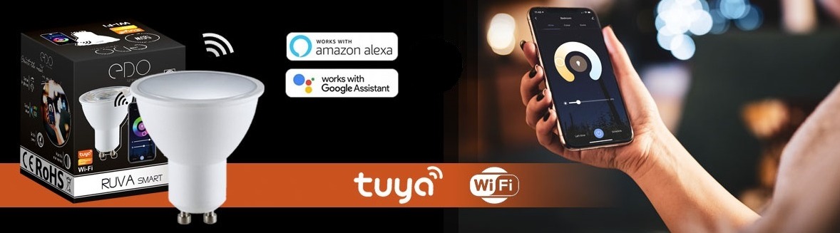 Prezentacja inteligentnej żarówki LED EDO RUVA SMART z aplikacją mobilną Tuya, współpracującej z Amazon Alexa i Google Assistant. Opakowanie produktu i dłoń trzymająca smartfon.