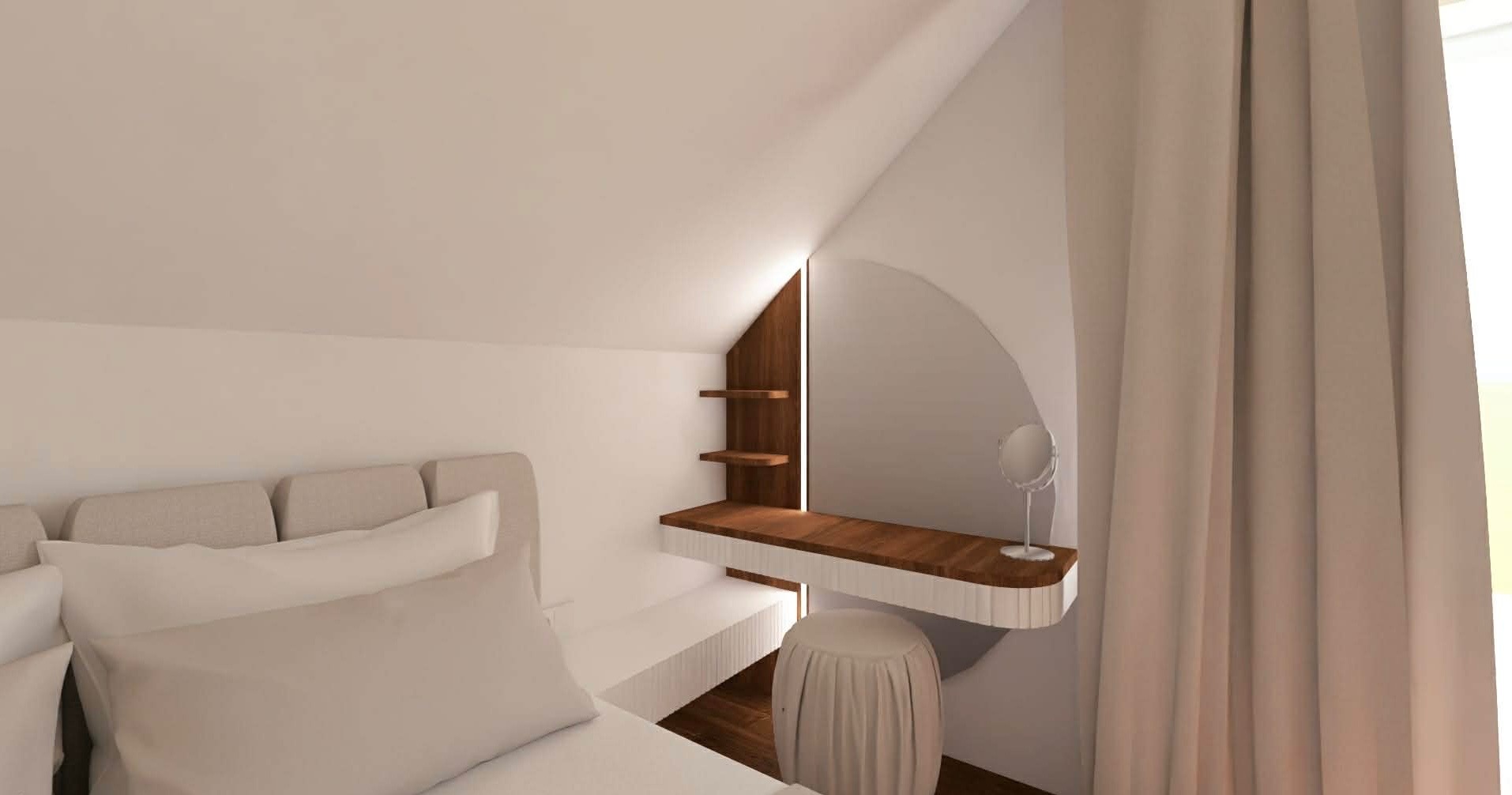 Jasna sypialnia na poddaszu z toaletką z lustrem w kształcie łuku, drewnianym blatem i półkami. Obok łóżko z beżowym zagłówkiem i białą pościelą.