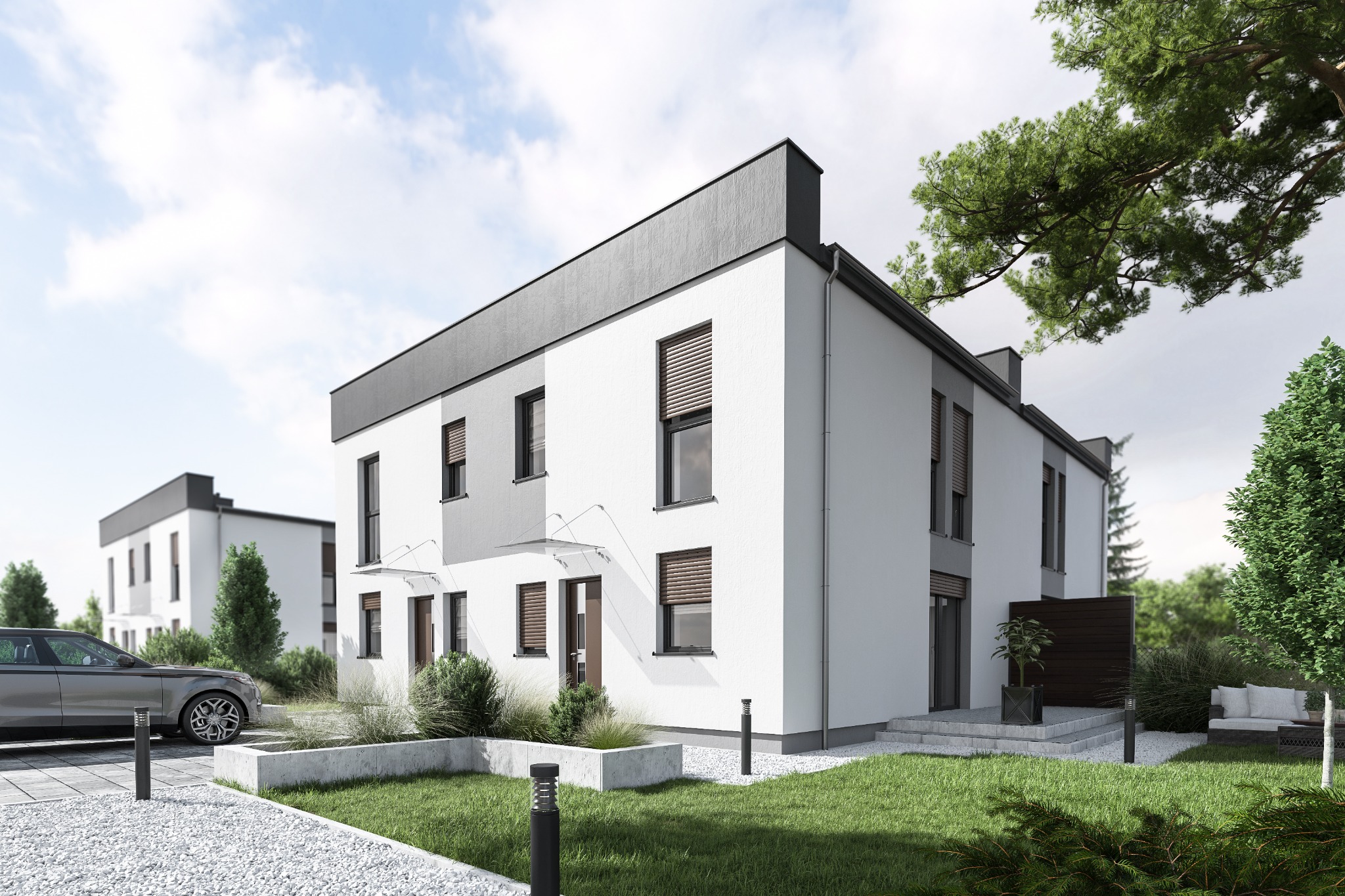 Nowoczesny, dwukondygnacyjny dom bliźniak z szarą elewacją i dużymi oknami, otoczony zielenią i białym żwirem. Na podjeździe stoi szary samochód.