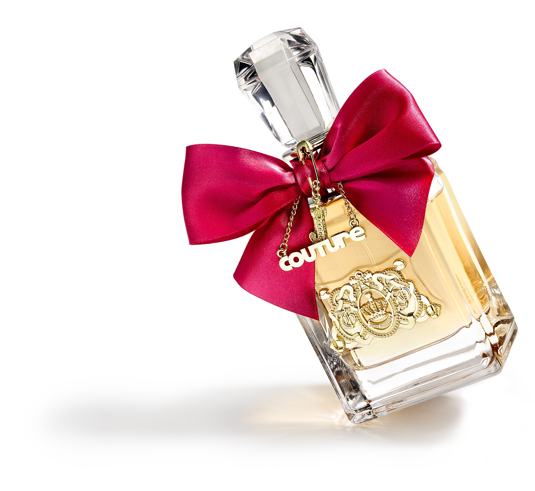Elegancki flakon perfum z różową kokardą i złotym napisem 'couture' na białym tle, przechylony pod kątem.