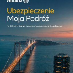 IB Projekt Izabela Nowak - Baner reklamowy Allianz 'Ubezpieczenie Moja Podróż' na tle oświetlonego mostu wiszącego i panoramy miasta o zmierzchu, z tekstem o zakupie ubezpieczenia turystycznego.